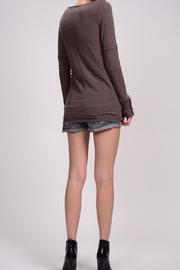 Three button cuff long sleeve V-neck T-shirt in toast.  Back view.